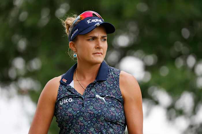 Lexi Thompson plays her tee shot on the 8th hole during the first round of the Kroger Queen City Championship at the Kenwood Country Club in Cincinnati, Ohio.
